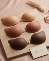 Front view of silicone adhesive bra cups showing mango shape and front clasp