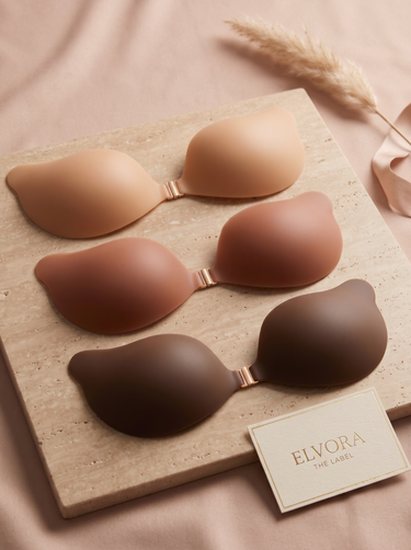 Front view of silicone adhesive bra cups showing mango shape and front clasp