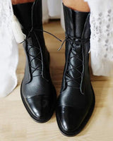 Leather ankle boots with lace-up front closure, side view