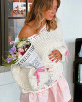 Side view showing the asymmetrical hemline of the jumper