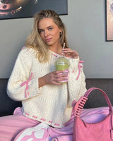 Close-up of the front tie detail on the jumper