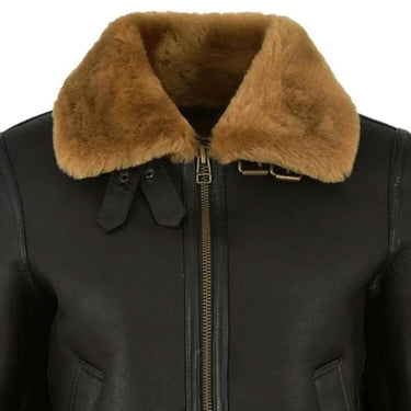 Close-up of the fold-over shearling collar and shearling cuff trim