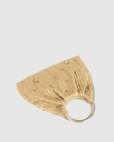 Close-up of the metallic bead details on the woven straw surface of the hobo bag