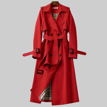Side view showing the longline silhouette and belted waist of the trench coat