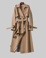 Front view of a longline double-breasted trench coat with self-tie belt and notch lapel