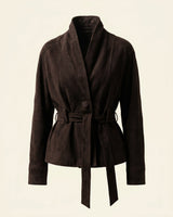 Front view of a belted suede jacket with wrap front and self-tie waist belt