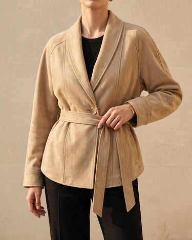 Detail shot of the self-tie belt on a suede wrap jacket