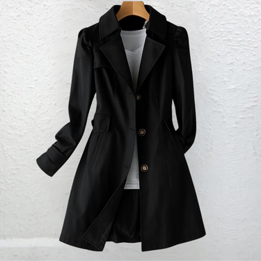 Side view showing the mid-length silhouette and belted waist of the trench coat