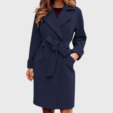 Detail shot of the lapel collar and belted waist of the trench coat