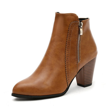 Close-up of side zip fastening on ankle boots