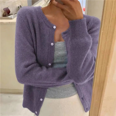 Back view of a women's hip-length button-front knit cardigan