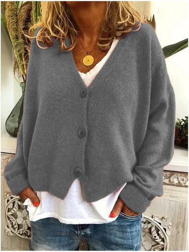 Back view of the fine knit cardigan with long sleeves and straight hem