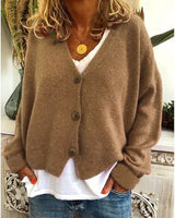 Cardigan worn open over a fitted top, showing relaxed drape