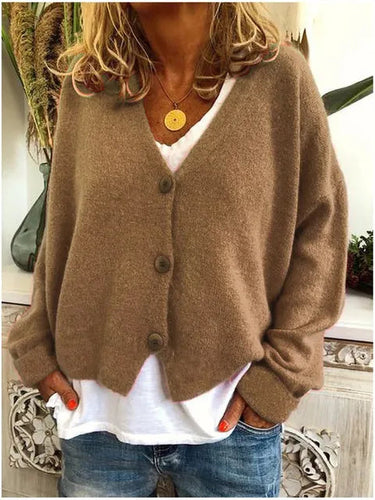 Cardigan worn open over a fitted top, showing relaxed drape