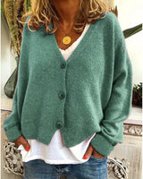 Front view of a fine knit button front cardigan with V-neckline and relaxed fit