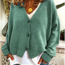 Front view of a fine knit button front cardigan with V-neckline and relaxed fit