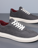 Front view of minimalist men's low top casual trainer