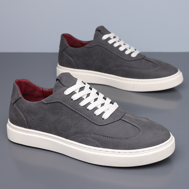 Front view of minimalist men's low top casual trainer