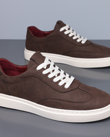 Rear view of men's low top trainer showing heel and sole profile