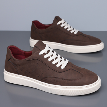 Rear view of men's low top trainer showing heel and sole profile