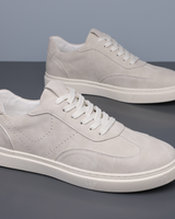 Top-down view of men's low top trainer with lace-up detailing