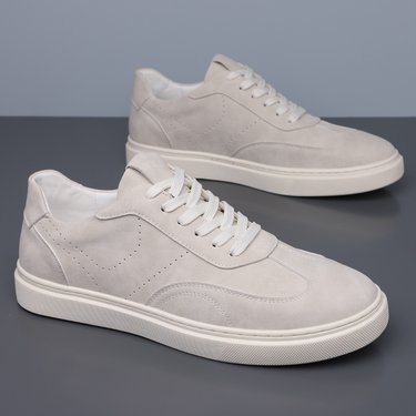 Top-down view of men's low top trainer with lace-up detailing