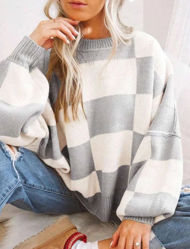 Model wearing the checked jumper in khaki styled with everyday clothing