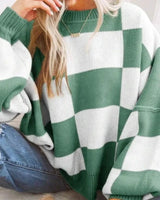 Back view of the checked jumper showing the pattern across the shoulders