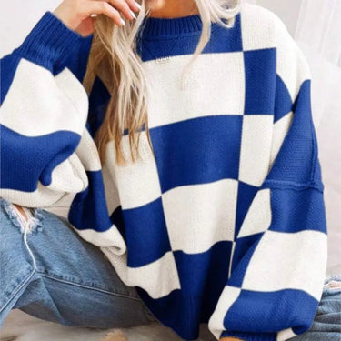Close-up of the round neckline on the checked knitted jumper