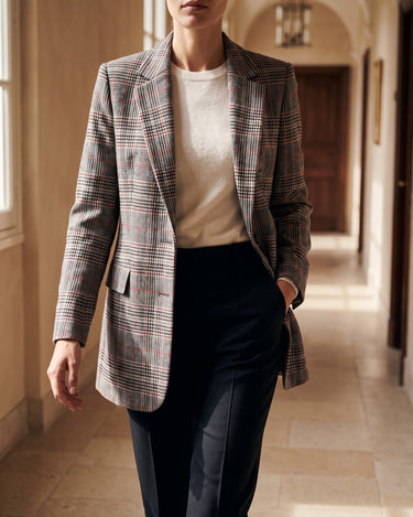 Three-quarter view of the checked wool blazer showing the full silhouette