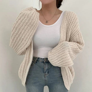 Close-up of chunky ribbed knit texture on the body of the cardigan