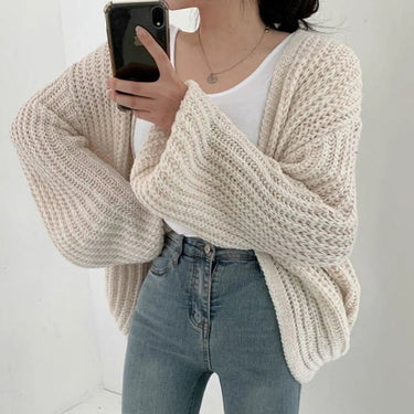 Back view of longline oversized cardigan with balloon sleeves