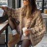Oversized chunky cable-knit cardigan with dropped shoulders and open front