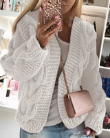 Chunky knit cardigan side view showing length and sleeve detail