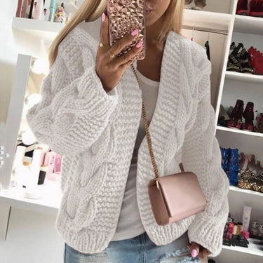 Chunky knit cardigan side view showing length and sleeve detail