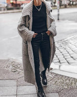 Front view of oversized drop-shoulder cardigan with rib knit texture