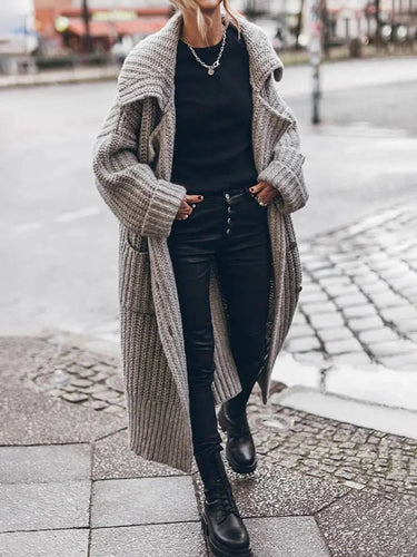 Front view of oversized drop-shoulder cardigan with rib knit texture