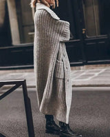 Side view showing longline hem and deep integrated side pocket
