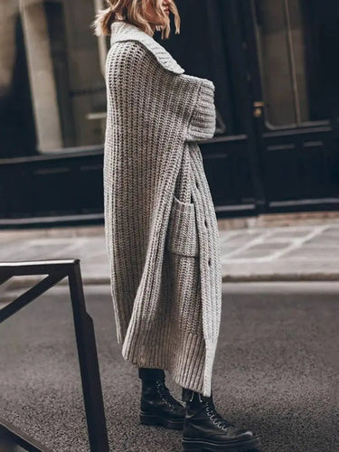 Side view showing longline hem and deep integrated side pocket