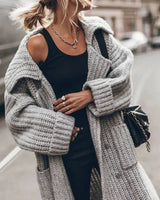 Close-up of chunky rib knit texture and notched lapel collar