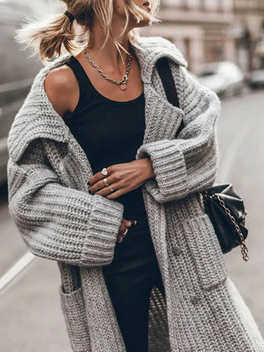 Close-up of chunky rib knit texture and notched lapel collar