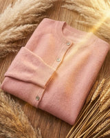 Back view of the knit cardigan showing ribbed hem and sleeve detail