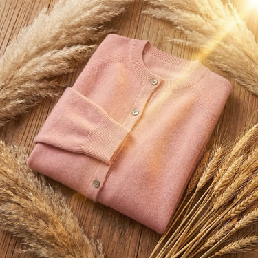 Back view of the knit cardigan showing ribbed hem and sleeve detail