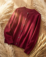 Side view of the hip-length cardigan showing overall silhouette