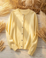 Detail shot of the ribbed hem at the base of the cardigan
