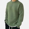 Men's crew neck pullover with solid woven finish, front view