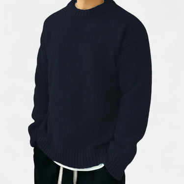 Side view of men's pullover showing ribbed hem and cuffs