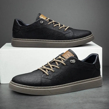 Front view of low-profile faux leather sneaker with ridged sole