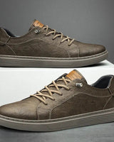Rear view of men's faux leather sneaker showing heel and sole profile