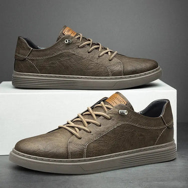 Rear view of men's faux leather sneaker showing heel and sole profile